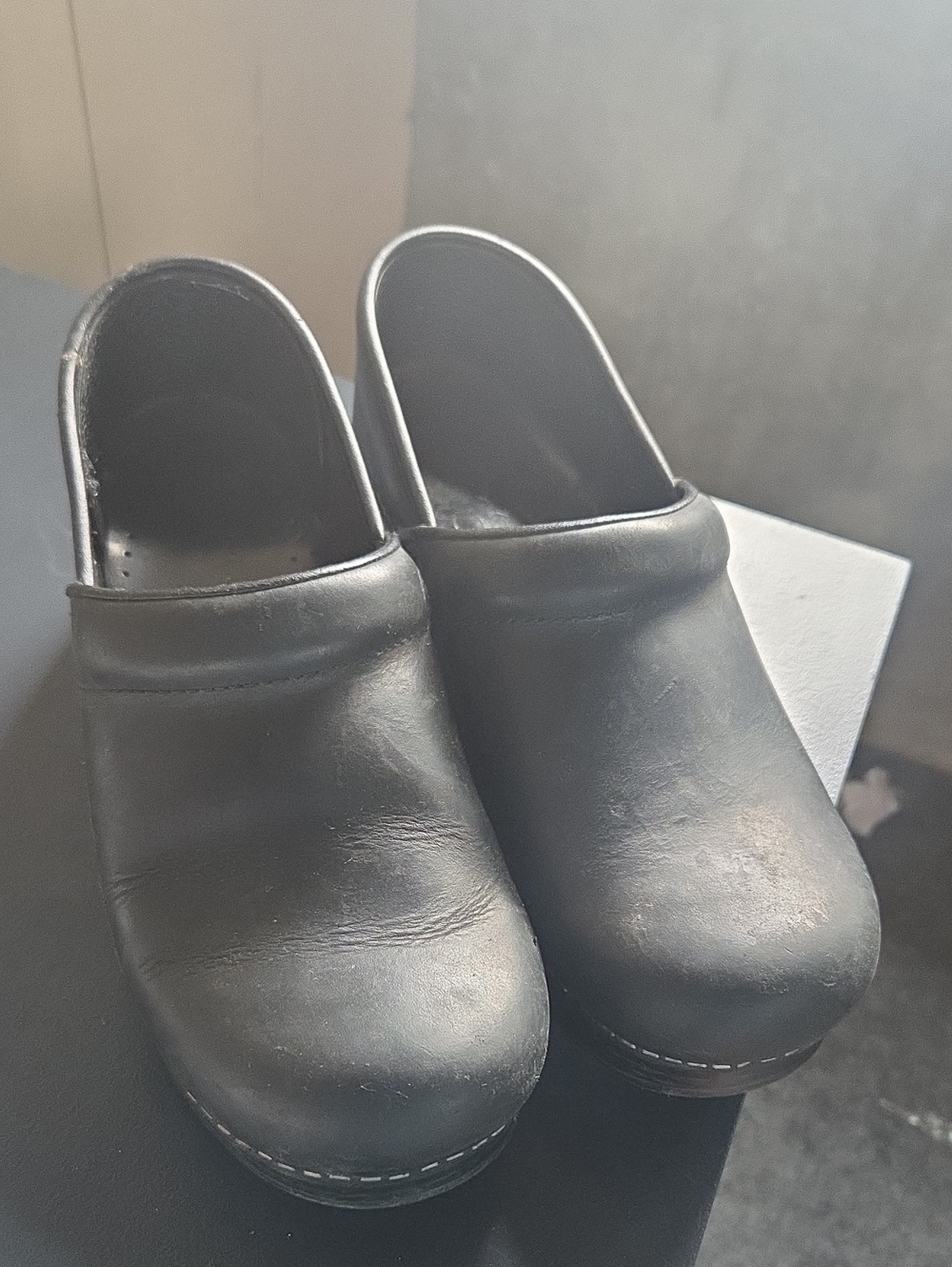 Women's Dansko Black Leather Slip-On Clogs